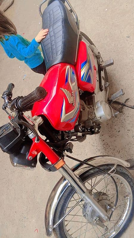 honda 125 red km 20000 lahore number 2