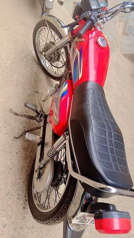 honda 125 red km 20000 lahore number 3