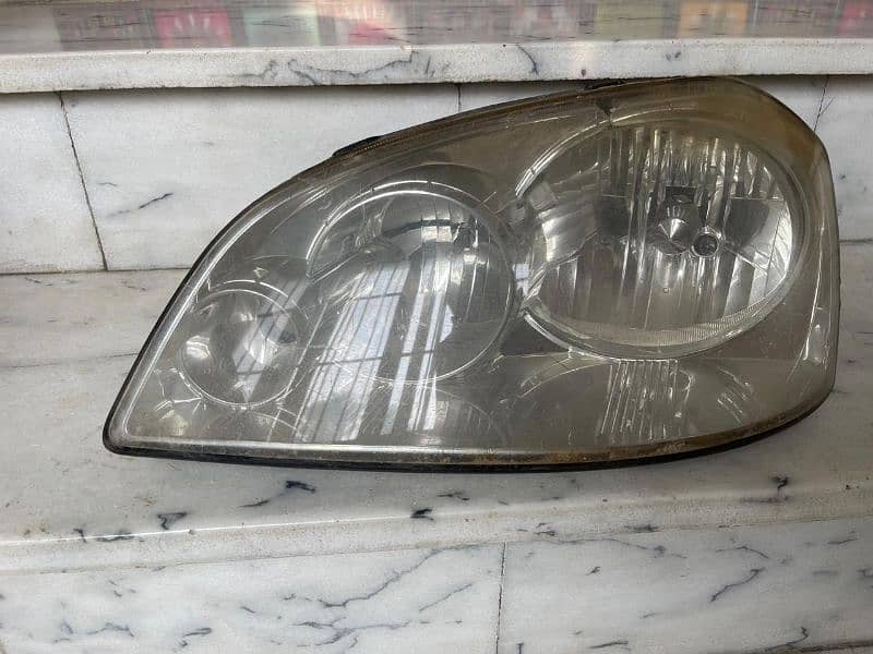 Chevrolet optra left headlight 0