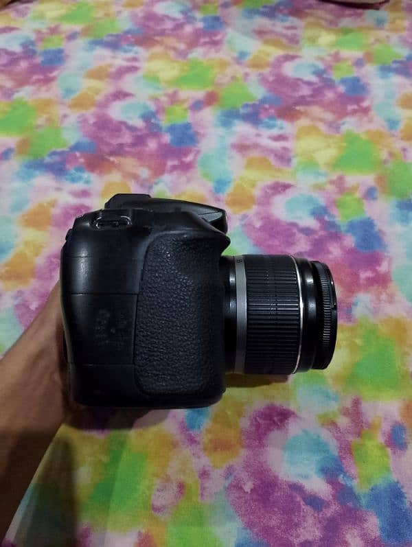 Canon eos 60d with lens, charger and battery. 1