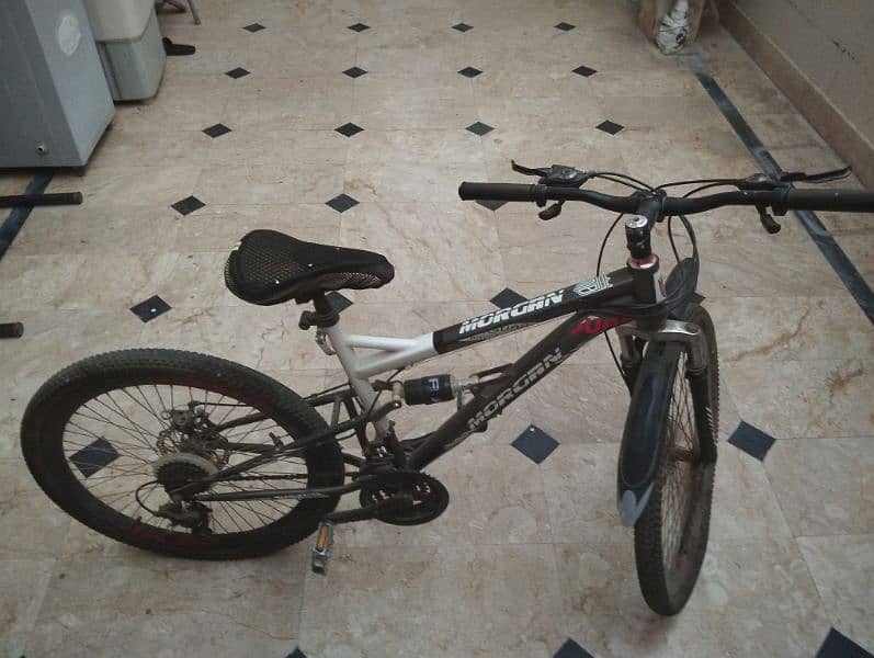 gear bike with original rims,tyres and gears suspension are working 1