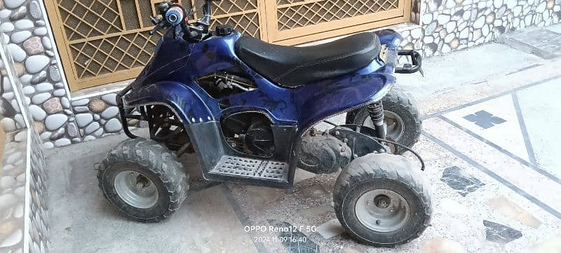 70 cc motorcycle  hai  10 by 10 condition hai 2