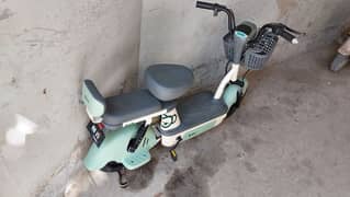 electric scooty self import from china with all assambly