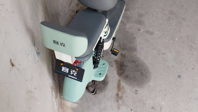 electric scooty self import from china with all assambly 1