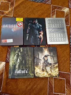 5 STEELS BOOKS COMPLETE ,4 XBOX 360 CDS,1 PS4,1XBOX ONE