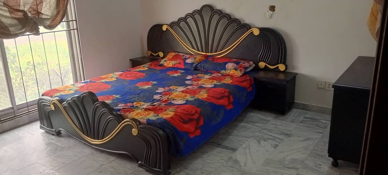 Double bed with 2nd mattress with side table and dressing table. 2