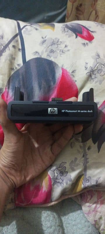 Hp photosmart M-series dock never used price is nagotiable 0