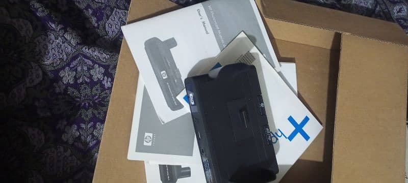 Hp photosmart M-series dock never used price is nagotiable 2