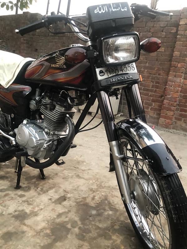 Honda 125 black 4