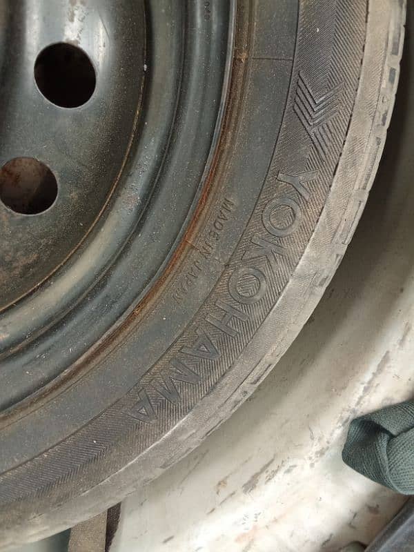 155/65 R14 75S Tire + Rim 1