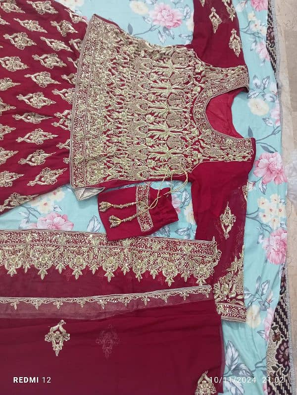 New design Bridal lehnga blood Red color with pure kora work 1