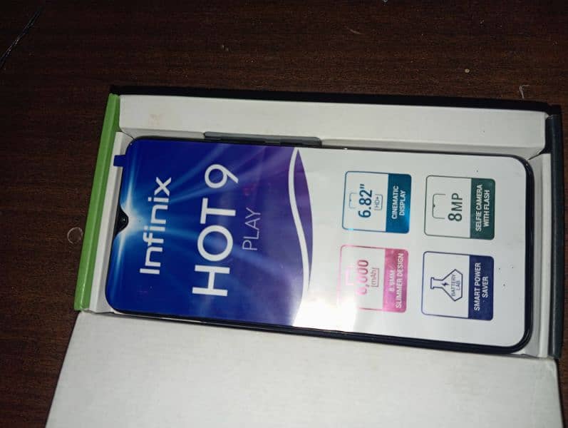 Infinix hot 9 play 4/64 storage Dual SIM PTA aaproved  with Box 7