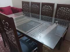 Dinning table with 6 carved chairs