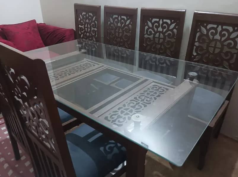 Dinning table with 6 carved chairs 0