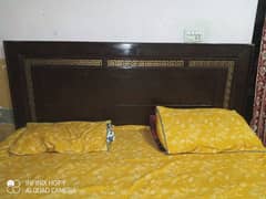 Wooden bed for sale in good conditions