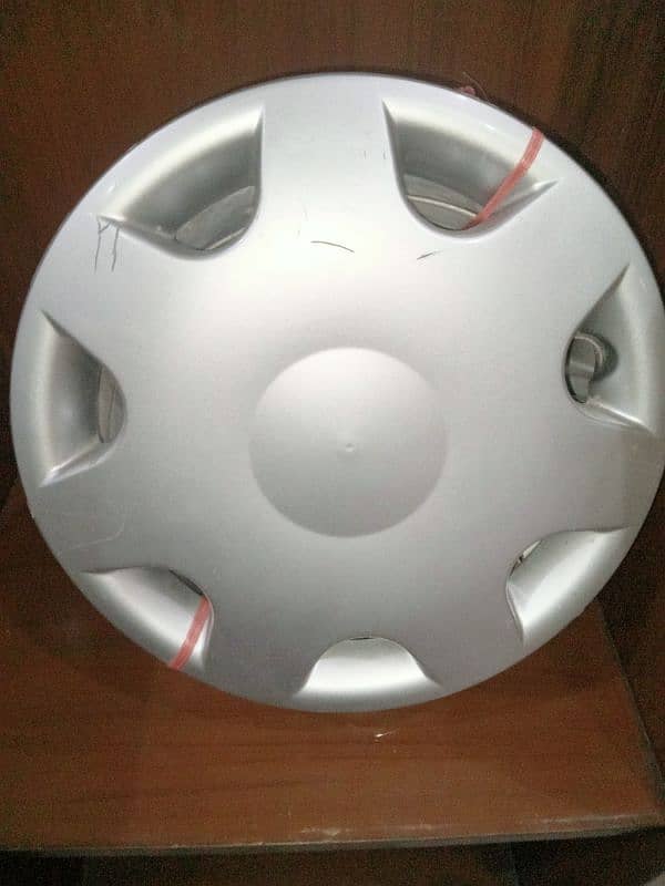 Genuine Suzuki mehran Wheel Cap 0