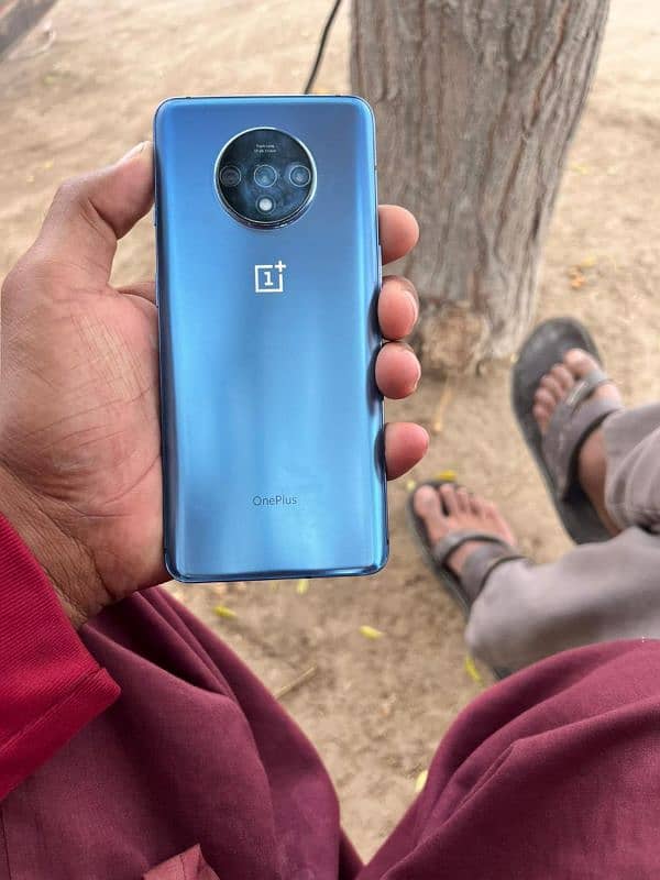 OnePlus 7t 256 gb global 03014141936 sirf is no PE rbta Kare Whts call 4