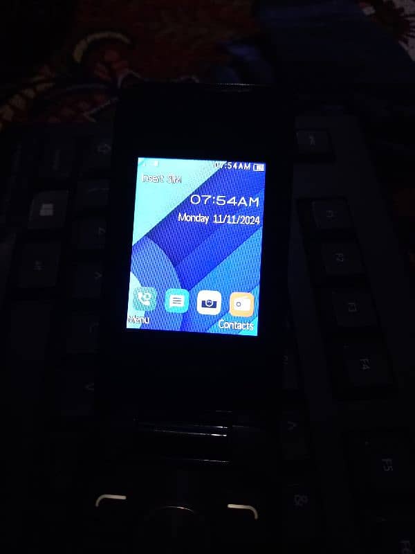 alcatel  mobile, folding mobile, keypad mobile 4