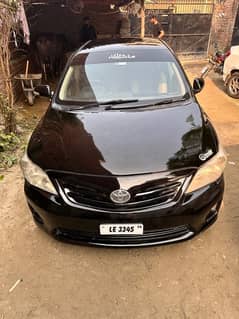 Toyota Corolla XLI 2013 to convert gli own name urgent sale