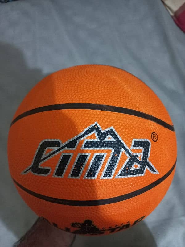 slightly Used basket ball with basket 0