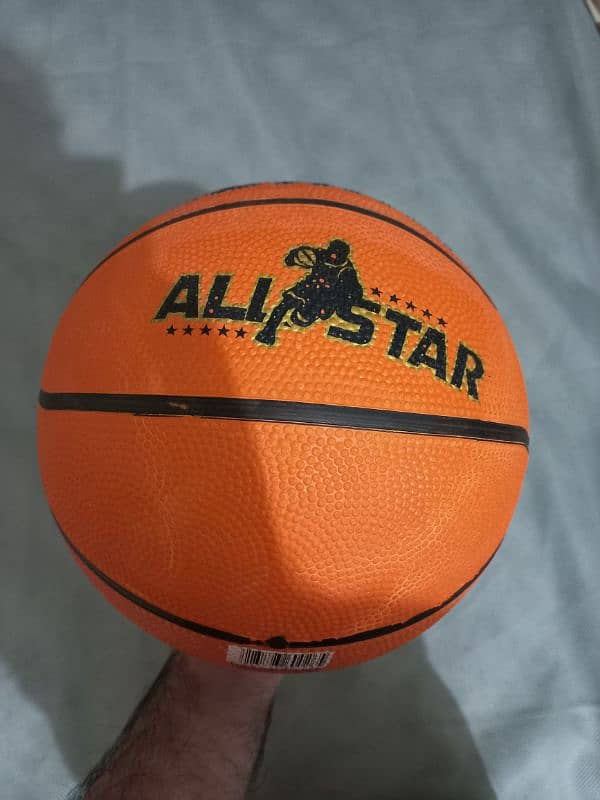 slightly Used basket ball with basket 1