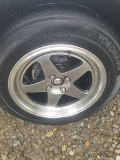 195~65~15 Yokohama bluearth 4 tires  along with 15 inch rims