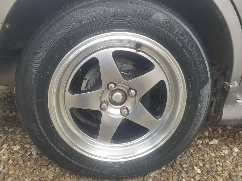 195~65~15 Yokohama bluearth 4 tires  along with 15 inch rims 4