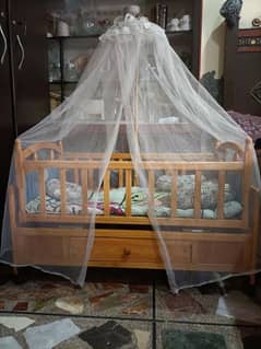 beautiful wooden baby cot/bed