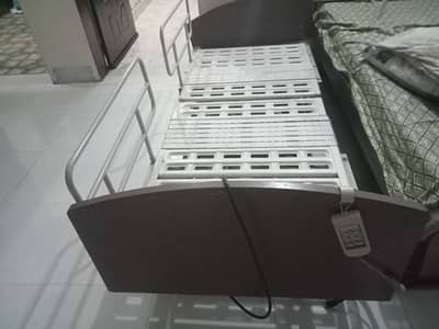 electric bed. surgical bed hospital bed. patient bed.