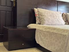 double bed with side tables and mattress