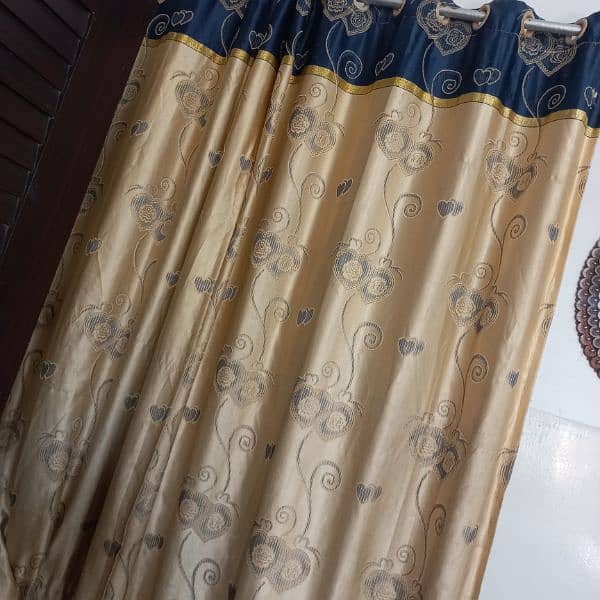 5 curtain in blue nd golden colour 1