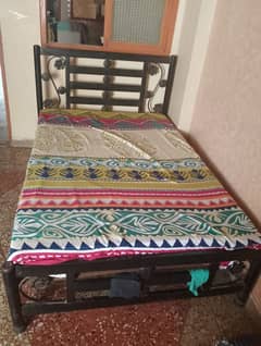 single bed in use condition