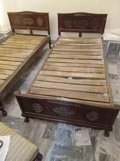 Pure sheesham chinioti twin beds.