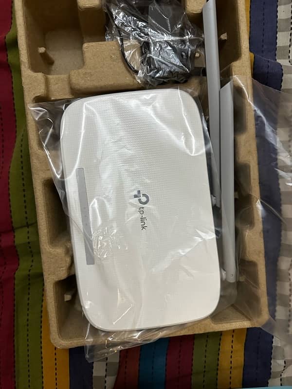 TP Link Excellent Condition 300Mbps Modem router 1