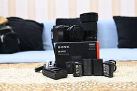 Sony a6400 with kit lens 16-50 and Sigma 30mm