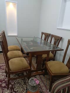 6 seater dining table set, wooden chairs, glass on top,