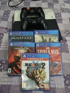 PlayStation 4 with 5 Titles And 2 Controllers