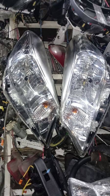 Vitz 2012 model original Head lights 0