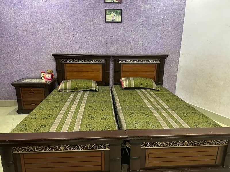 2  wooden single beds with mattress 1