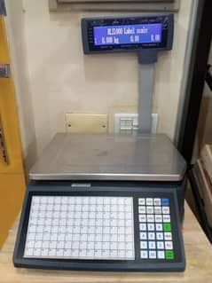 black cooper barcode label printer & weighing machine