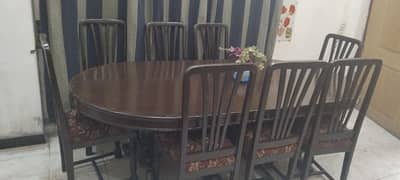 solid heavy wooden dinning with 8chairs in excellent condition