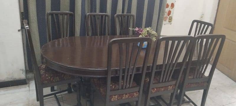 solid heavy wooden dinning with 8chairs in excellent condition 0