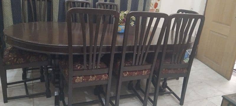 solid heavy wooden dinning with 8chairs in excellent condition 1