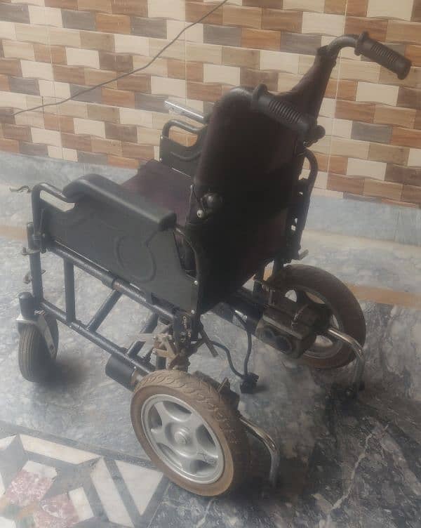 Motorized wheelchair imported foldable. 2 pieces 8