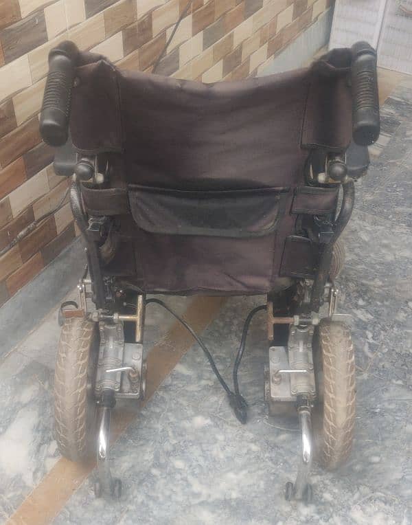 Motorized wheelchair imported foldable. 2 pieces 9