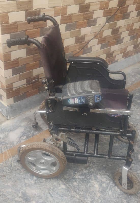 Motorized wheelchair imported foldable. 2 pieces 10