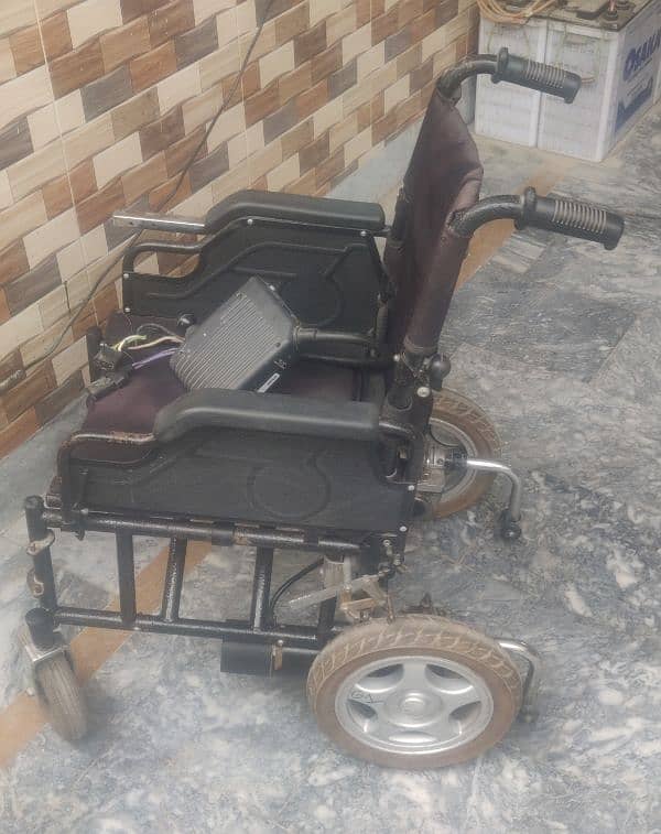 Motorized wheelchair imported foldable. 2 pieces 11