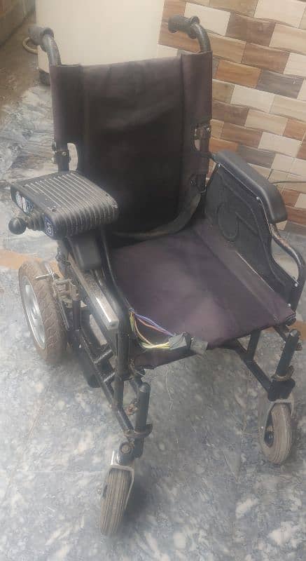 Motorized wheelchair imported foldable. 2 pieces 12