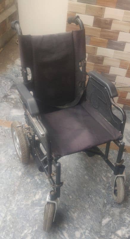 Motorized wheelchair imported foldable. 2 pieces 13