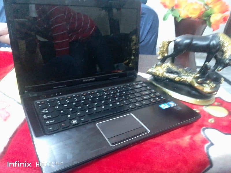 it is Lenovo laptop icor 3 generation window 10 with black colour 1